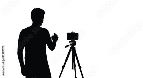 Vector graphic of a creative man presenting or recording a vlog on his mobile phone