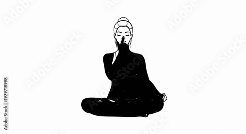 Woman in silhouette meditating in lotus pose with finger to lips
