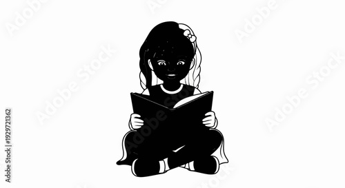 A young girl with dark hair and a bow reads a book, sitting cross-legged