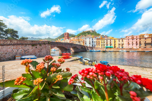 Remarkable cityscape of Bosa town with Ponte Vecchio bridge across the Temo river.