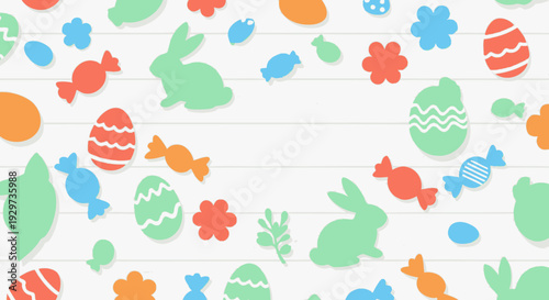 Colorful easter pattern with bunnies, eggs, and candy on wooden background