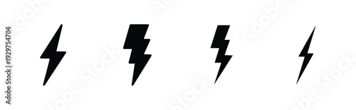 Four stylized lightning bolt icons black and white energy symbol set