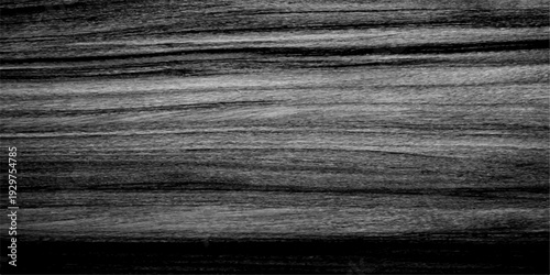 A dark grunge material background features a mix of black leather and black and white fabric texture set against a rough aged brown wooden plank surface with a natural timber grain pattern