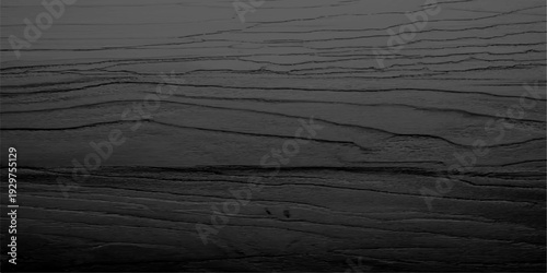 Sunlight illuminates morning sand dunes on the beach where a textured wooden plank with a natural brown grain surface creates a dark timber backdrop against the rough sand
