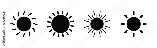 Set of four sun icons with varying ray designs and sizes representing sunny weather conditions