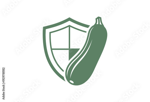 Simple green vector graphic illustration combining a stylized zucchini vegetable with a protective shield design on transparent background