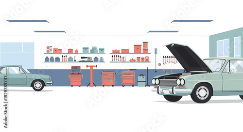 Retro auto repair shop with classic cars and vintage equipment