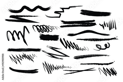 Collection of expressive black brush strokes and lines on white background