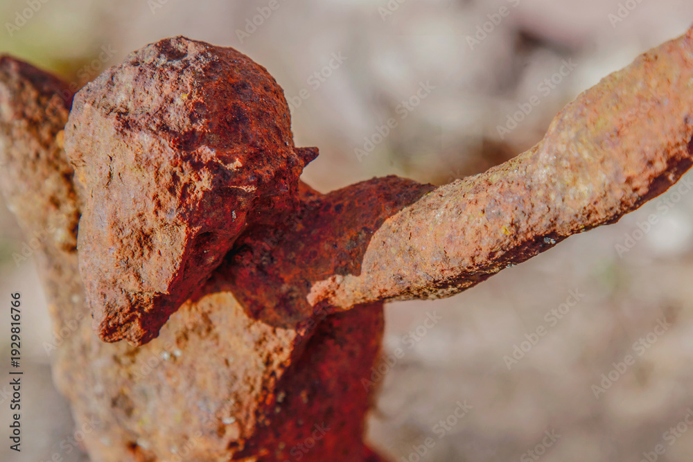 Obraz premium Historic iron crucifix sculpture with Jesus Christ, deeply worn and authentic, expressing timeless faith, sacrifice, and spiritual resilience.