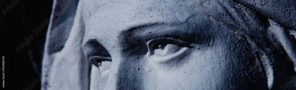 Obraz premium Monochrome close-up of Virgin Mary sculpture focusing on powerful eyes, inner pain, devotion, and timeless sacred emotion.