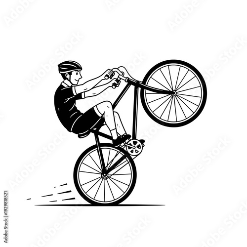 Cyclist performing a wheelie on a bicycle.