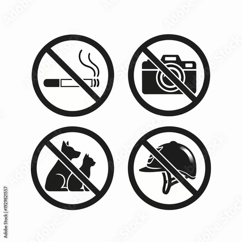 Set of four prohibition signs including no smoking, no photography, no pets, and no helmets allowed.