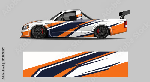 High-contrast race car with bold orange blue white livery and dynamic stripes.