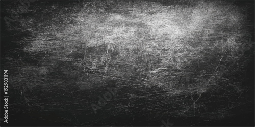 A dark and aged grunge background features a textured black and white stone wall pattern with a rough grey concrete surface and a vintage dirty paper frame design