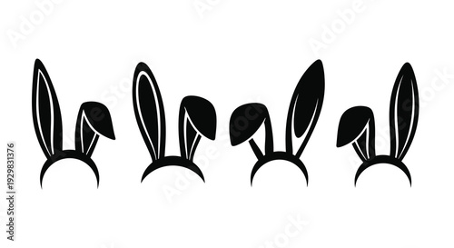 Four black rabbit ears are displayed in varying positions against a white background creating a minimalist silhouette high quality