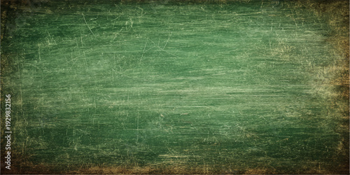 Aged green grunge canvas texture with a rough vintage paper pattern and brown dirty wall material providing blank copy space for a textured backdrop design