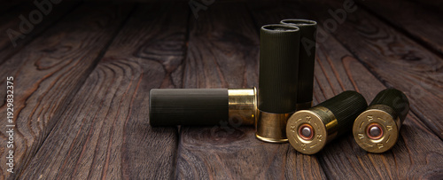Canvas Print Green Shotgun Shells On Wooden Table