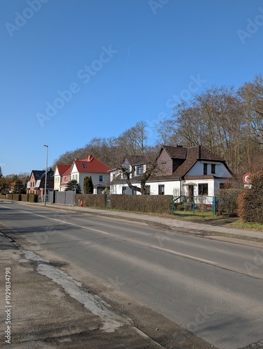 Residential Street with Houses and Blue Sky in Stralsund, Germany