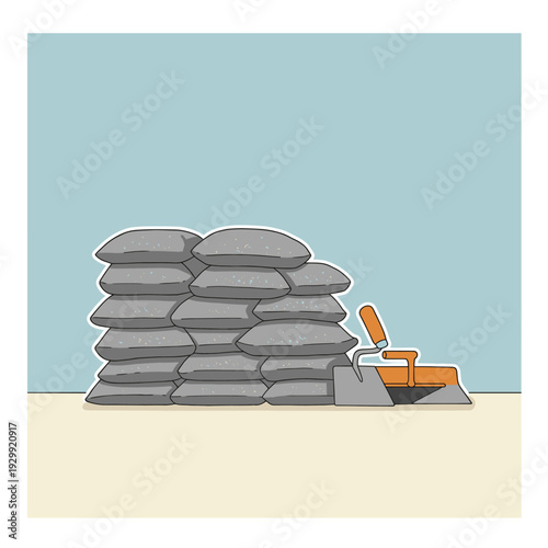Stack of grey cement or sand bags with construction tools like a trowel and shovel on a light yellow floor against a blue wall.