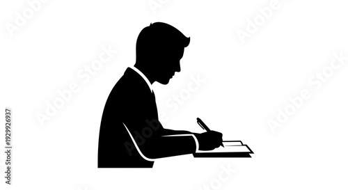 Man writing in a notebook with a pen, silhouette of a person working.