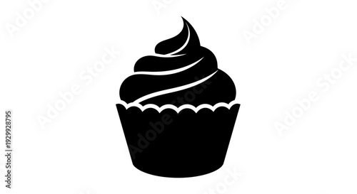 A black cupcake with swirled frosting viewed from the front on a clean white background