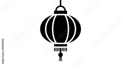 Traditional lantern hanging from a hook in a serene environment