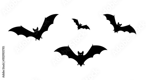 Silhouette of a flock of bats in mid flight against a stark white background conveying a sense of halloween and spooky