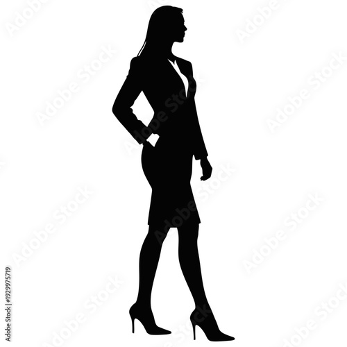 SILHOUETTE OF A STANDING BUSINESS WOMAN WITH A SUIT AND HIGH SHOES