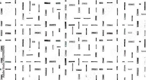 Abstract pattern of black dashes on a white background.