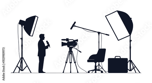 A male news reporter silhouette holding a microphone stands before a video camera and studio lighting equipment on a solid white background.