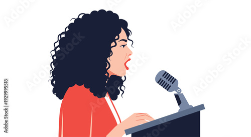 A woman with black curly hair wearing a red jacket speaks into a silver microphone while standing behind a dark podium in profile.