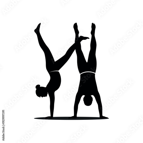 Two people silhouettes performing partner handstands forming a dynamic shape on a clean surface.