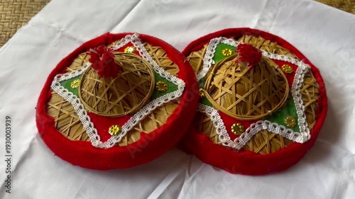 JAPI is a traditional conical hat from Assam, India, crafted from tightly woven bamboo, cane, and Tokou Paat (sun-dried palm leaves).It is a major cultural symbol of Assam, often used in Bihu dance