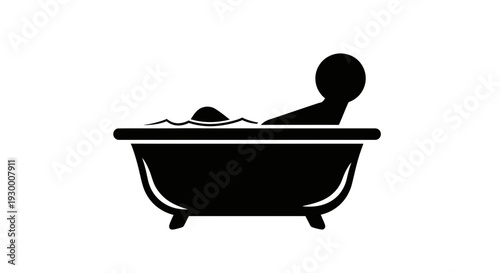 Silhouette of a person relaxing in a bathtub with water.