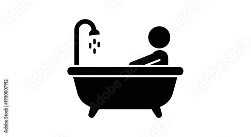 Person taking a relaxing bath in a bathtub with running water.