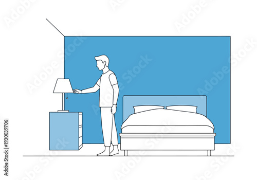 Person standing beside a nightstand with a lamp in a bedroom with a bed and blue wall decoration