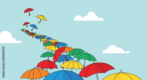 Colorful umbrellas fly in a blue sky with fluffy white clouds
