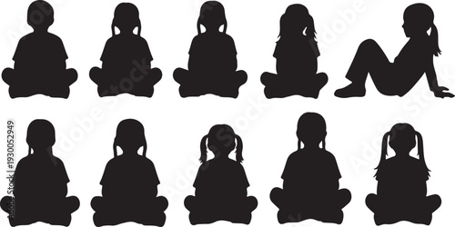 Set of eight black silhouettes of children sitting and relaxing in various poses, including cross-legged and upright positions on white,