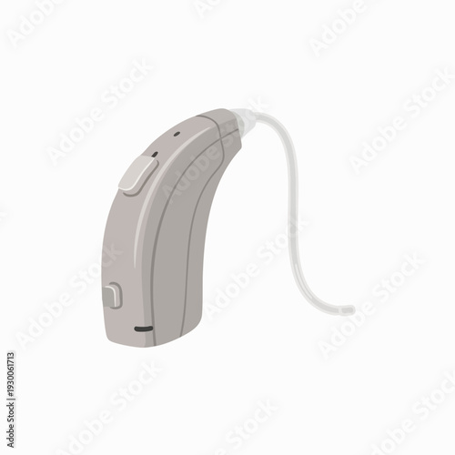 Modern gray behind-the-ear hearing aid isolated on white digital health and assistive technology for enhanced hearing in a simple studio shot
