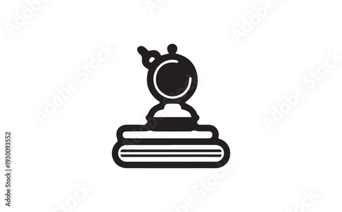 Vector icon of a trophy on a book