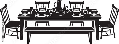 Black and white dining table with plates glasses and silverware