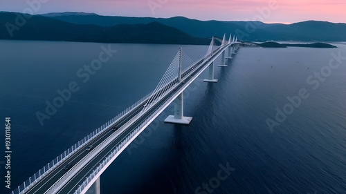 Wallpaper Mural Aerial view of Peljesac Bridge at sunset, modern cable-stayed bridge connecting Croatian mainland and peninsula, blue hour landscape.  Torontodigital.ca