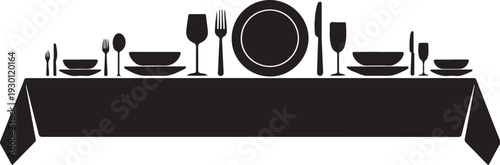 Black table setting with dinnerware and glassware dinner table