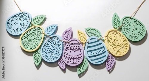 Colorful Easter egg garland with intricate designs and leaves