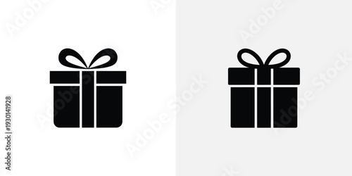 Two black gift boxes with ribbons on top for decoration and presentation purposes
