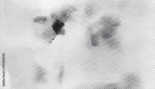 A black and white halftone image with a textured background and abstract shapes