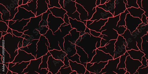A close-up view of red veins on a black surface, illustrating a network of veins from a top-down perspective