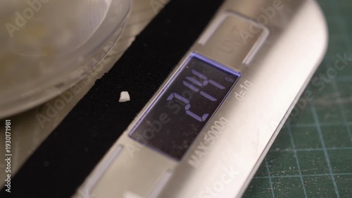 Laboratory scale for wax candles creating. Creative hobby DIY candles at home.
