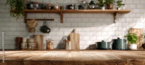 The wooden kitchen countertop in a cozy modern farmhouse kitchen with blurred background