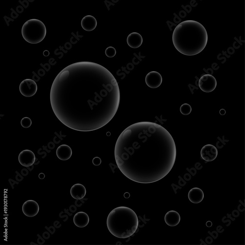 A collection of translucent shimmering bubbles against a black background